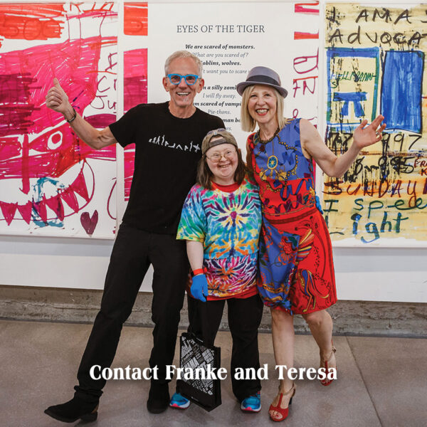 Photo of Bill, Franke and Teresa at Teresa's art show in 2019